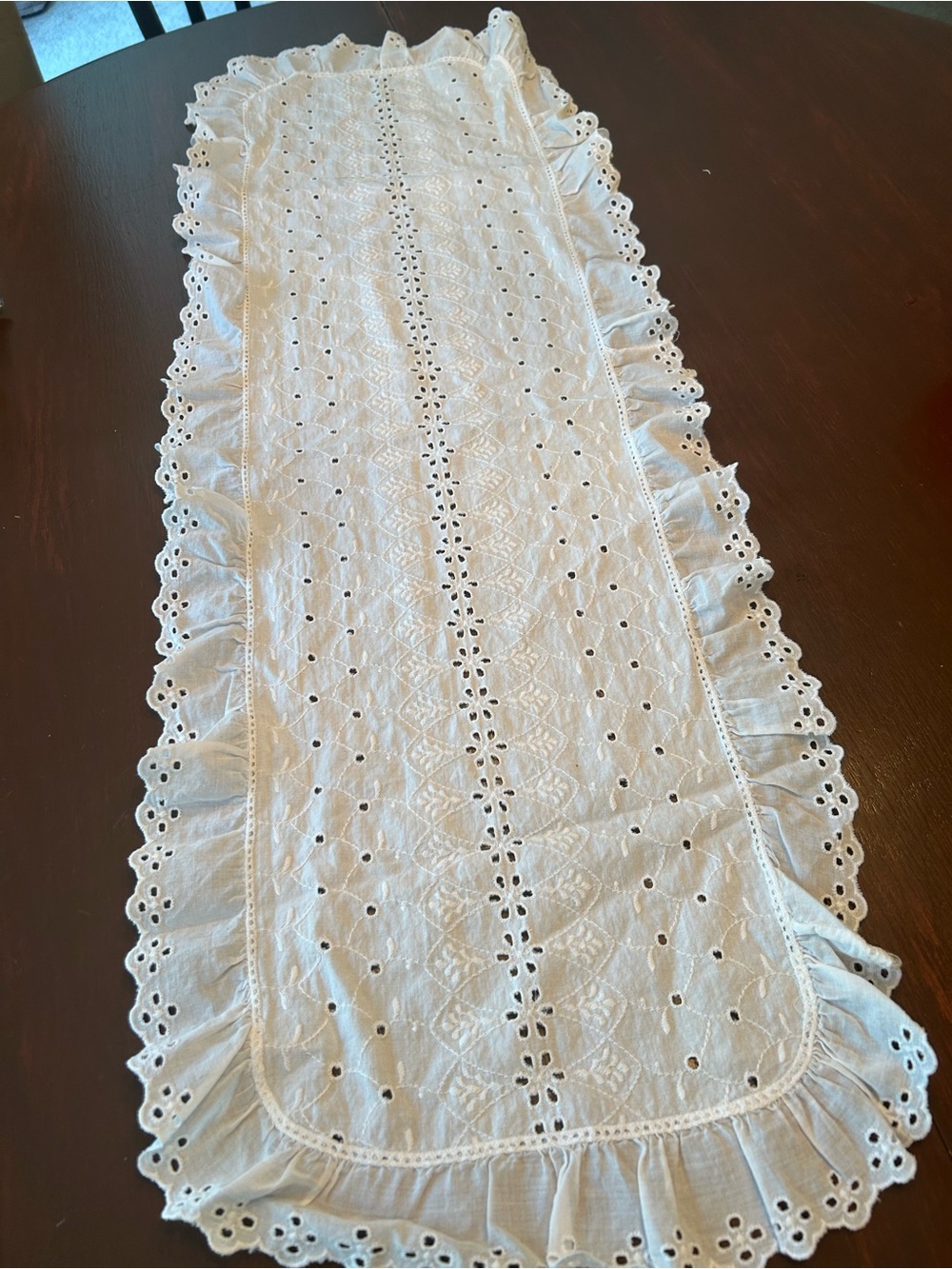 White eyelet table runner 38 in by 13
In